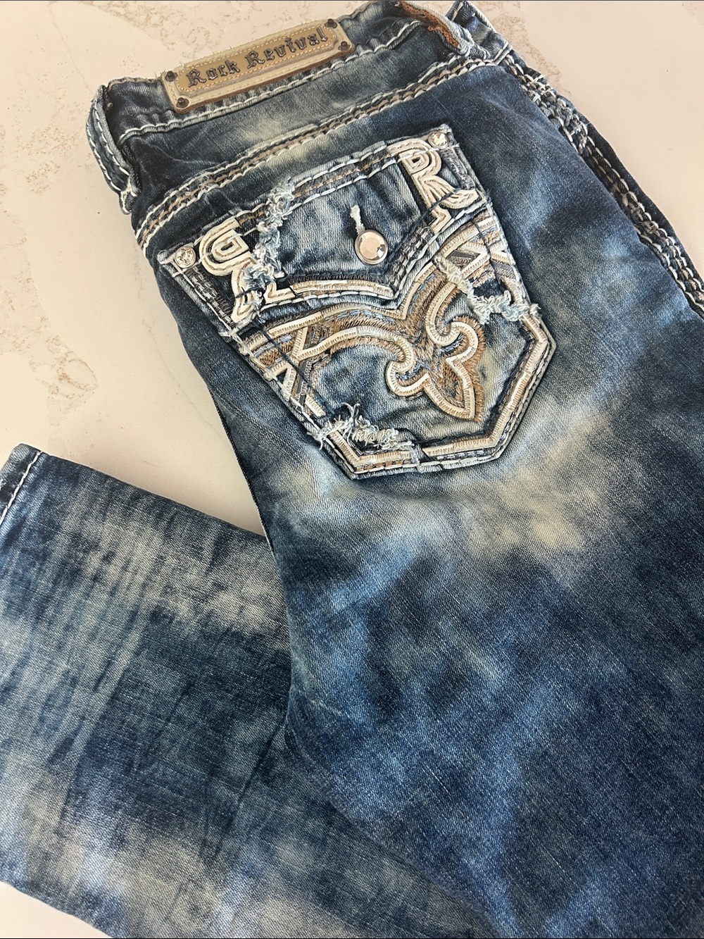 Woman’s Rock Revival Blue Washed Embroidered Pocket Mid-Rise Straight Jeans